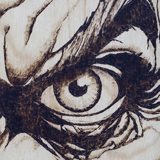 An unsettling, high-detail close-up of a wood-burnt eye, showcasing precise pyrography shading and texture.