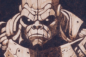 Macro detail of hand-burned pyrography on FSC-approved birch plywood, showing deep carbon textures and natural wood grain from Arrochar Crafts.